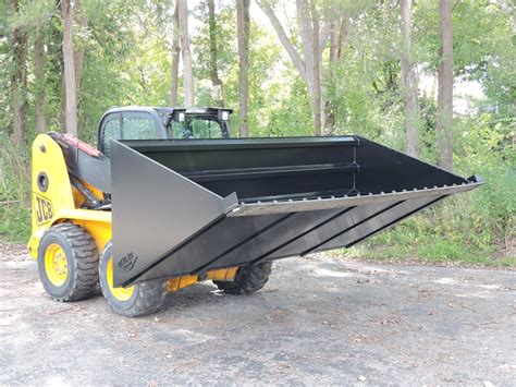 swapping a bucket to tamper of skid steer|skid steer attachments.